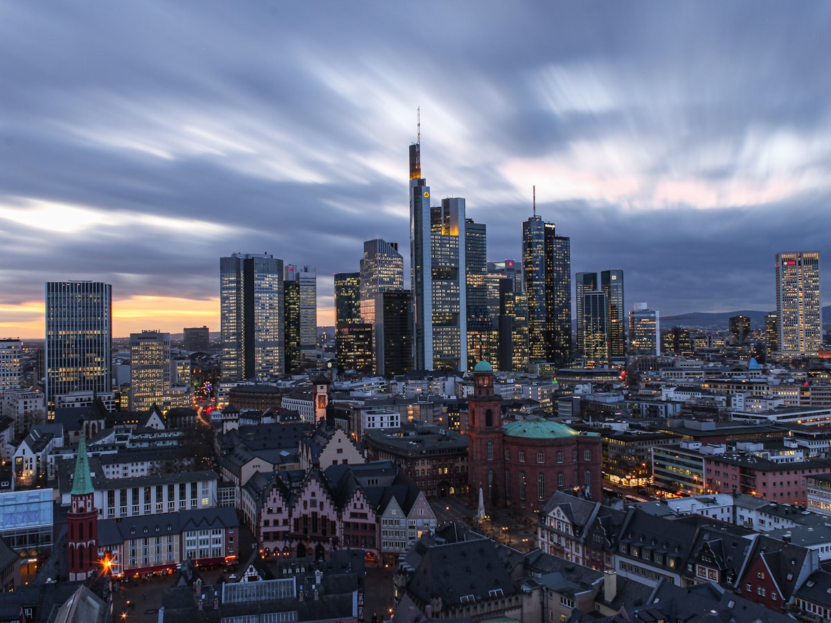 Frankfurt financial district skyline with modern skyscrapers under a cloudy sky