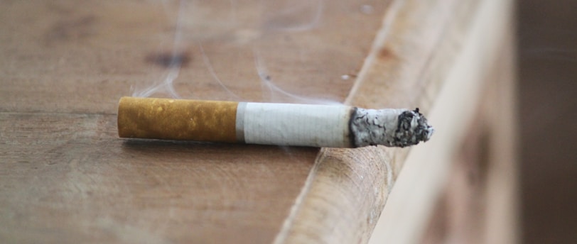 white and brown cigarette stick