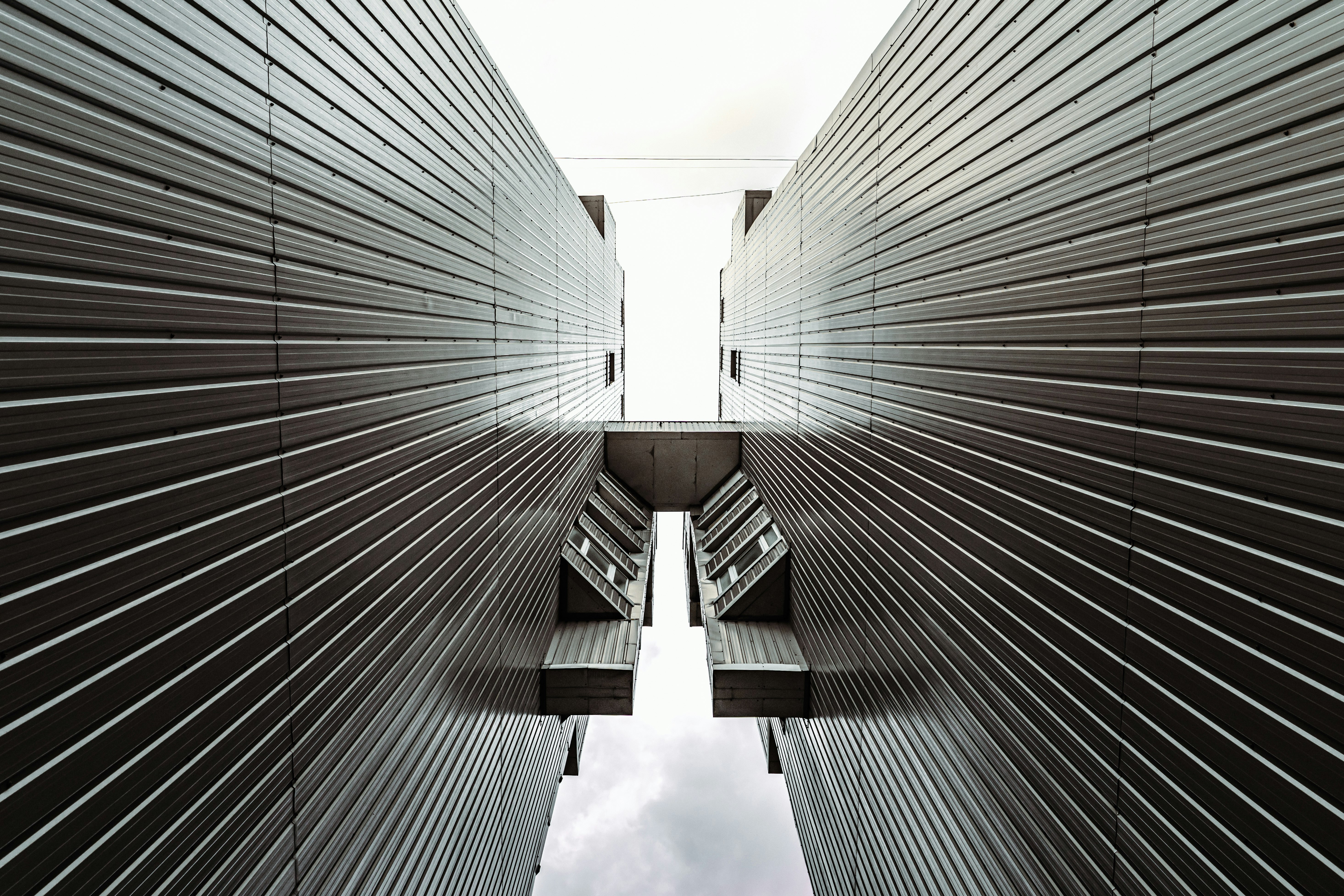 low angle photography of gray high rise building