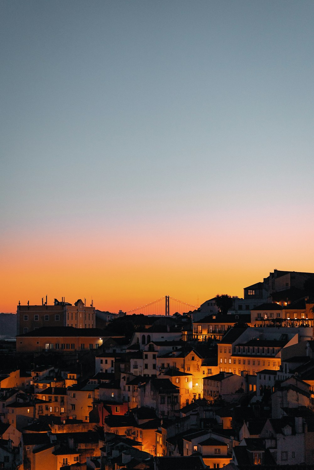 silhouette of buildings during sunset