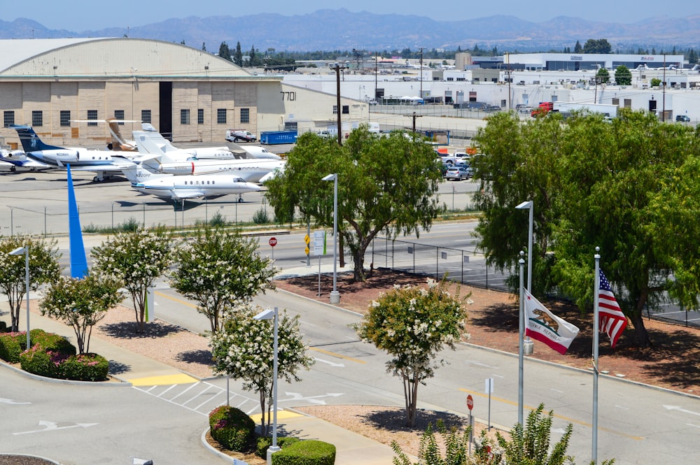 white airplane on airport during daytime