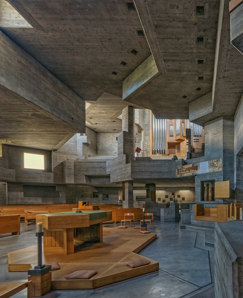 brown wooden tables and chairs inside building