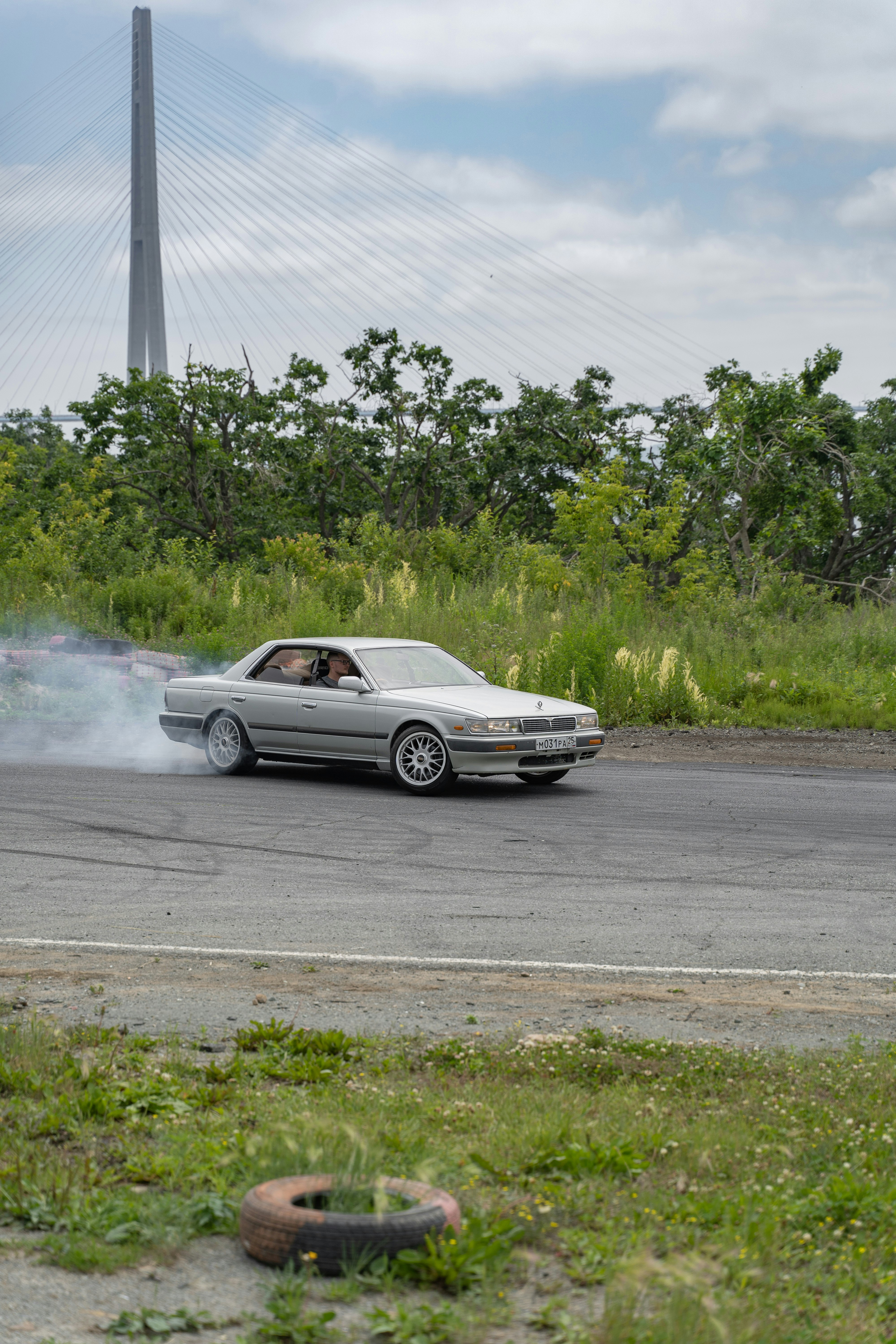 silver coupe on road during daytime