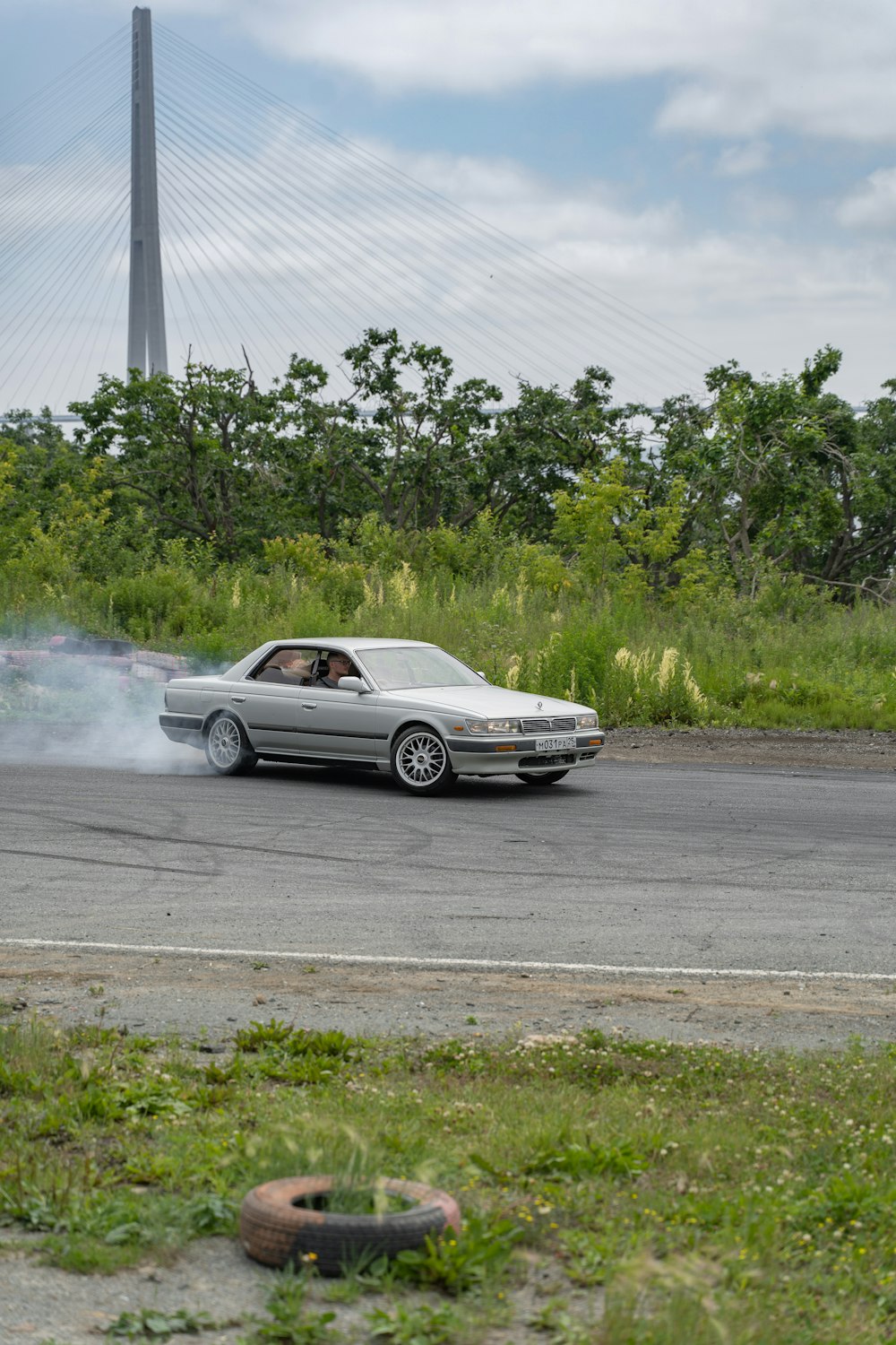 silver coupe on road during daytime