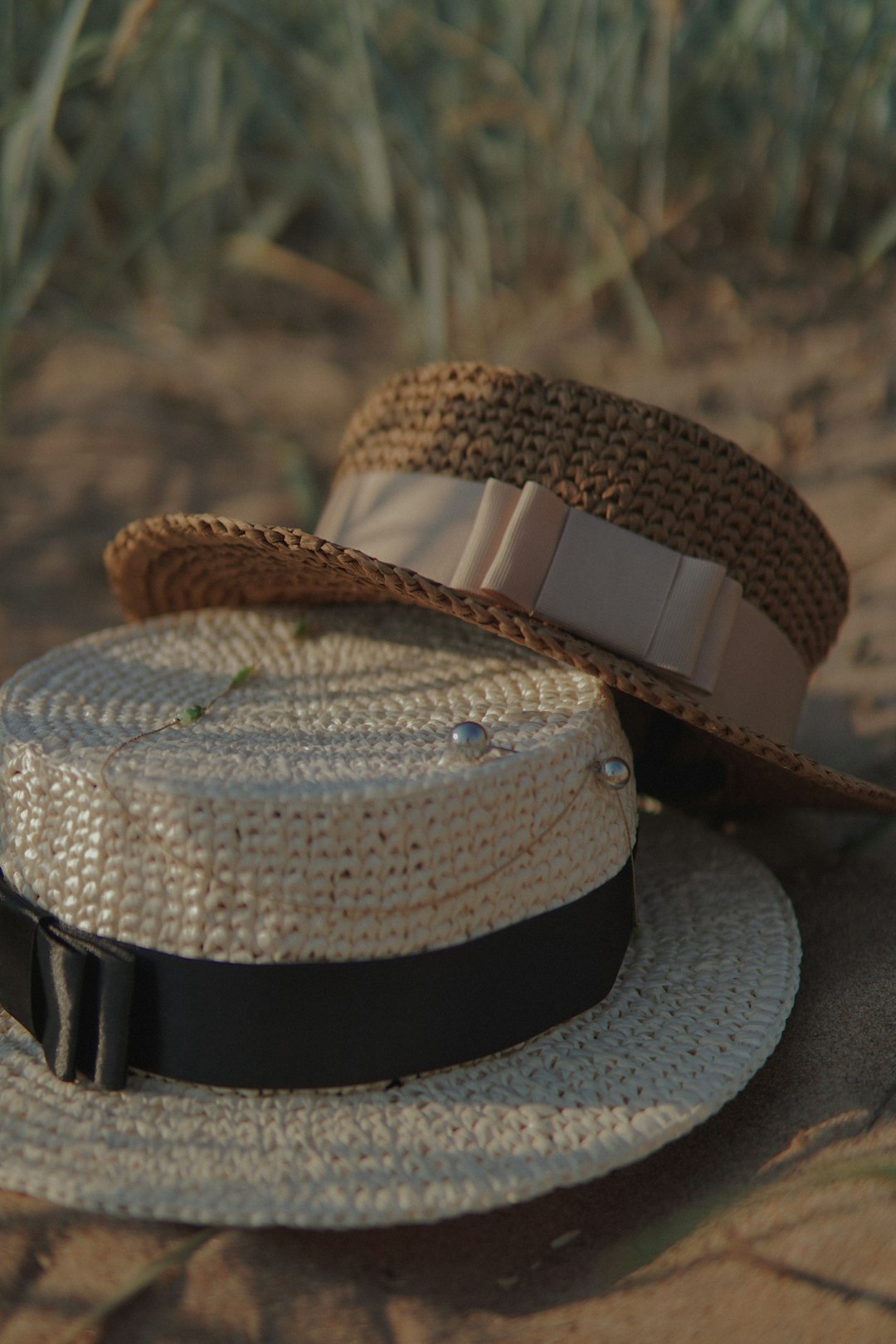 white and black fedora hat