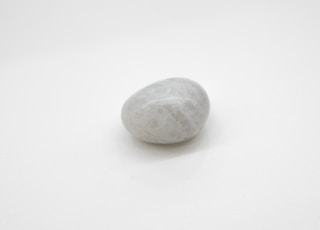 gray stone on white surface