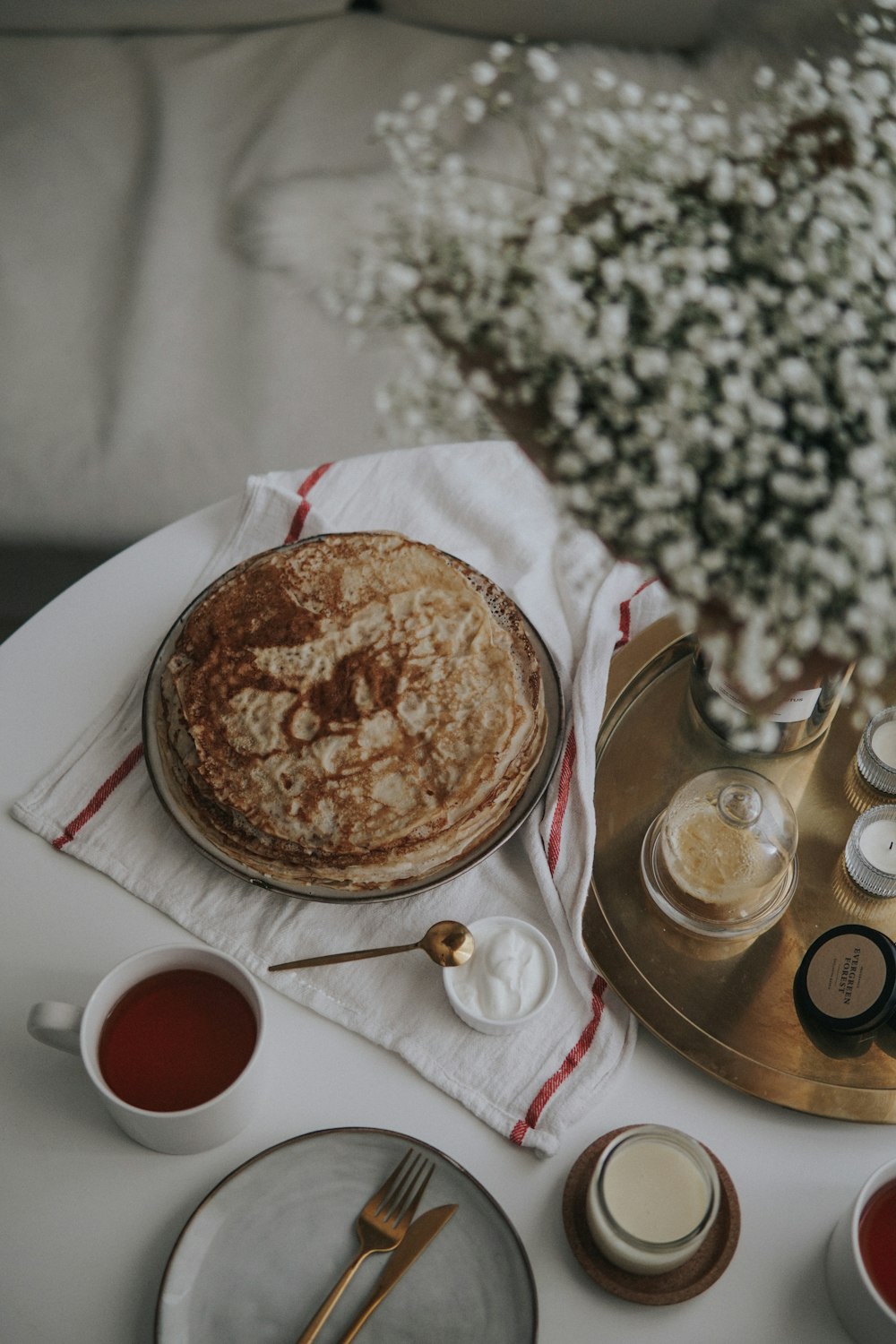 brown and white pie on white ceramic plate