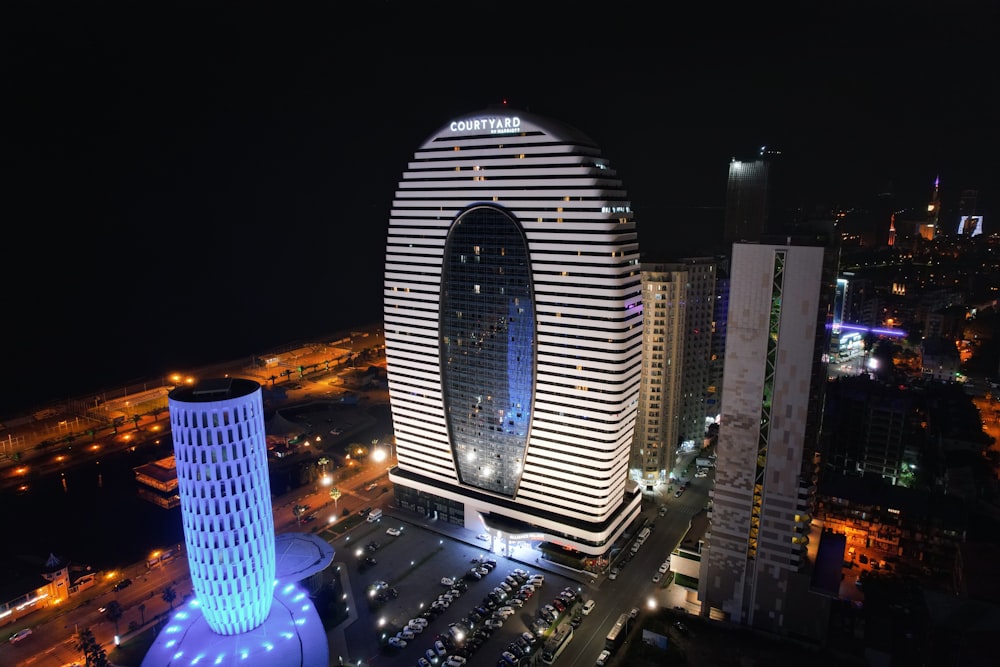 city with high rise buildings during night time