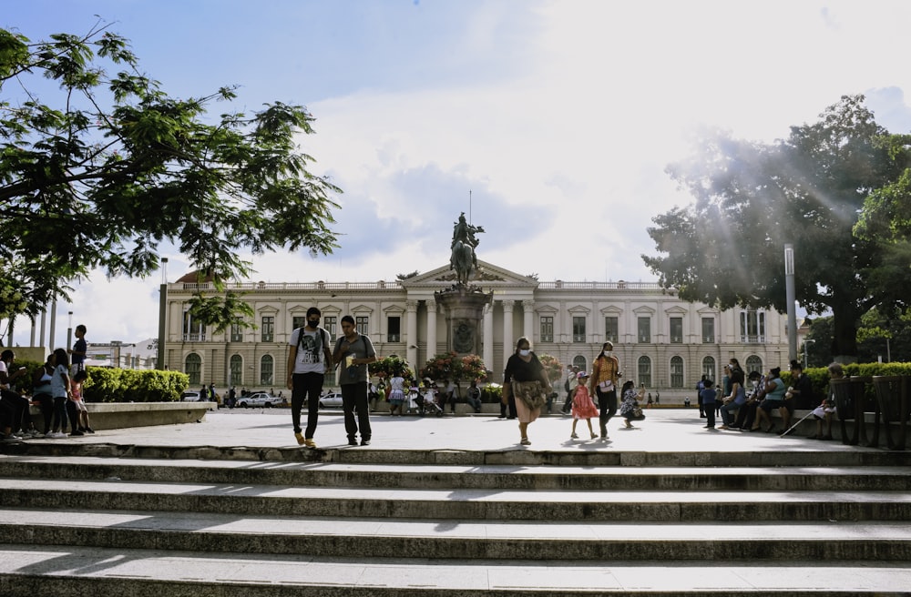 people walking on pedestrian lane during daytime