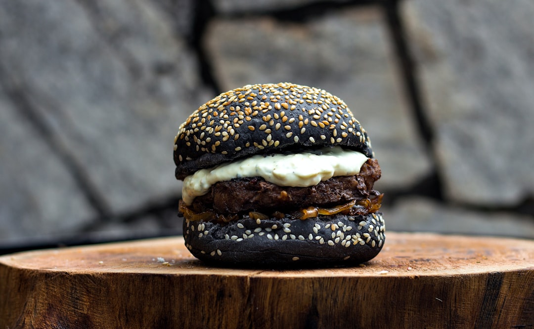 burger on brown wooden table