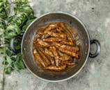 brown chili on stainless steel bowl