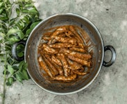 brown chili on stainless steel bowl
