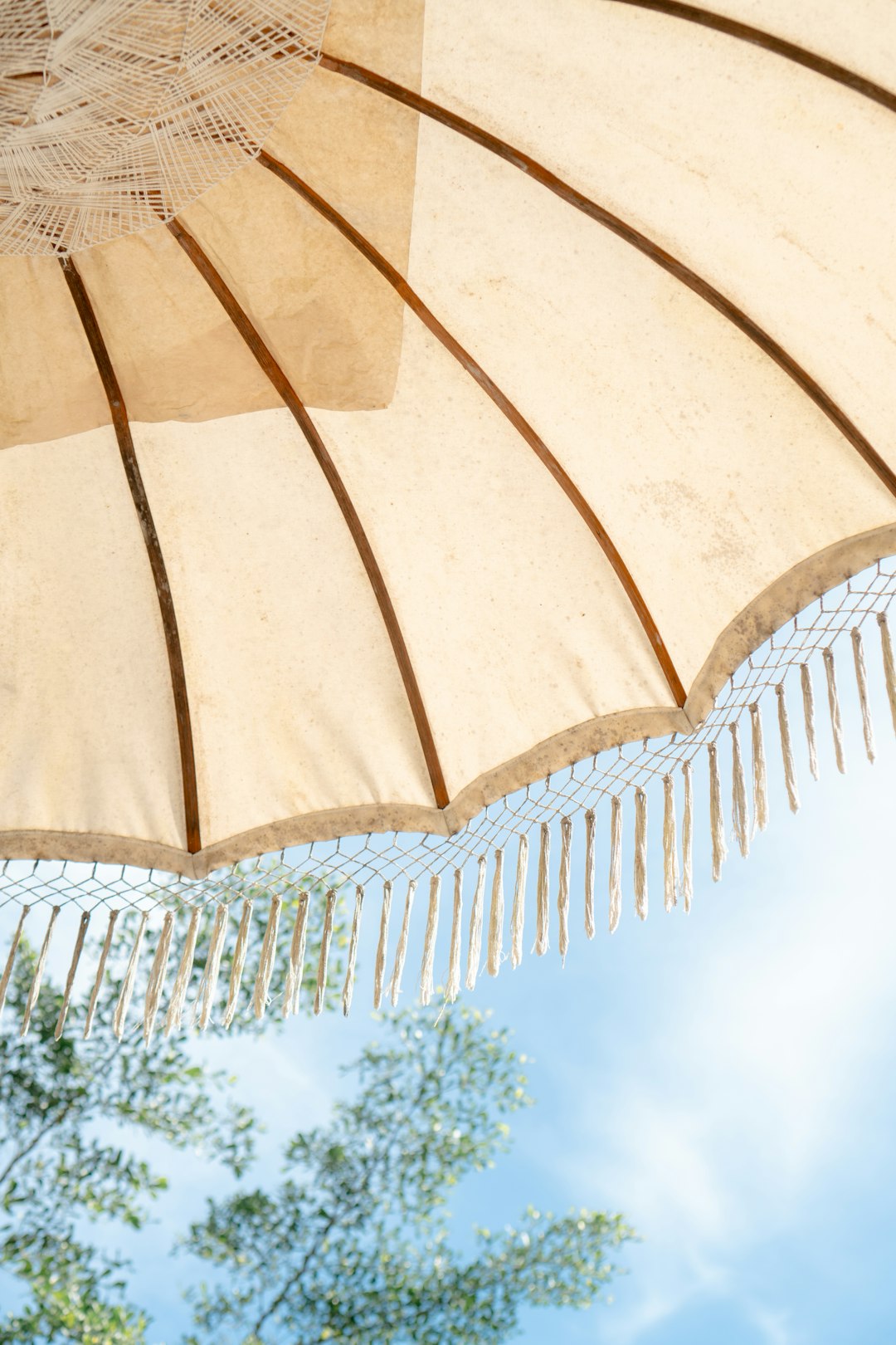 white and brown patio umbrella
