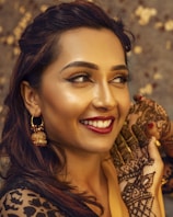 woman in black and brown floral dress