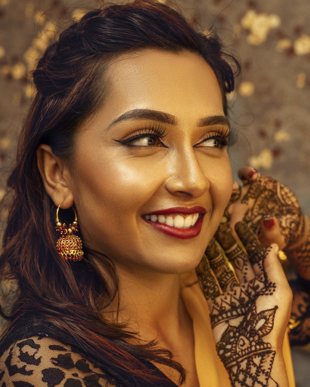 woman in black and brown floral dress