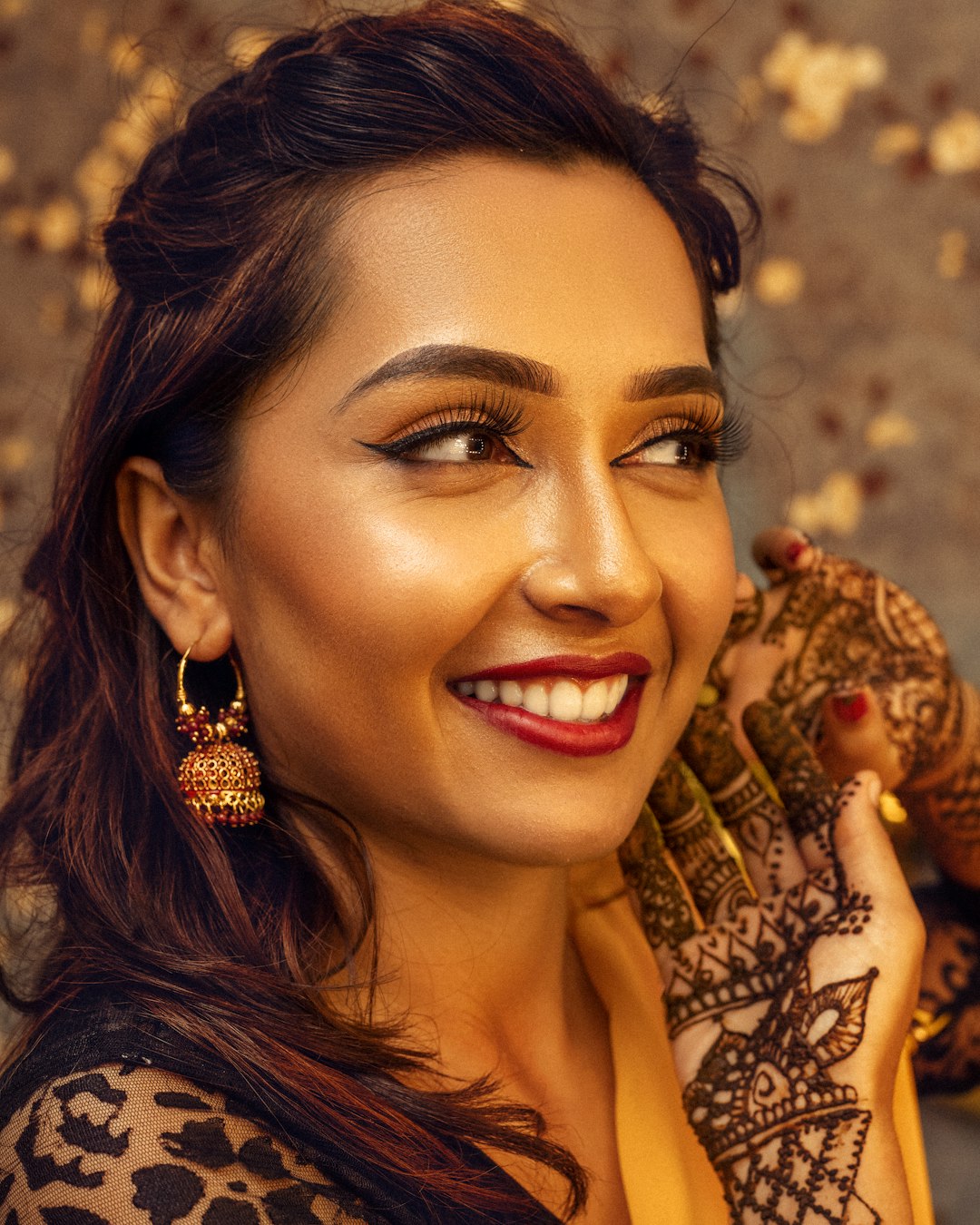 woman in black and brown floral dress