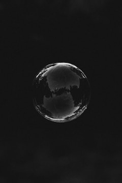 grayscale photo of moon and stars