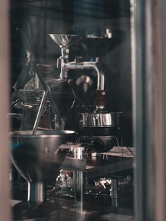 stainless steel and black stand mixer