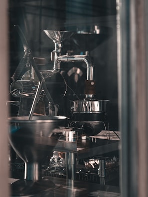 stainless steel and black stand mixer