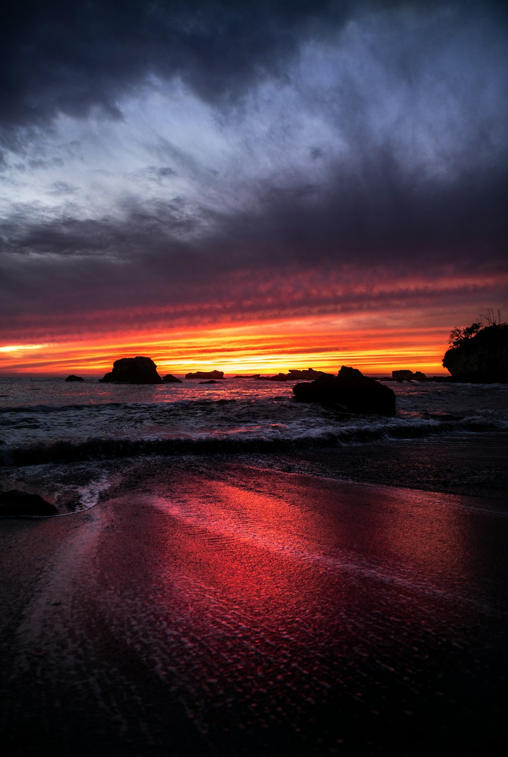 body of water during sunset