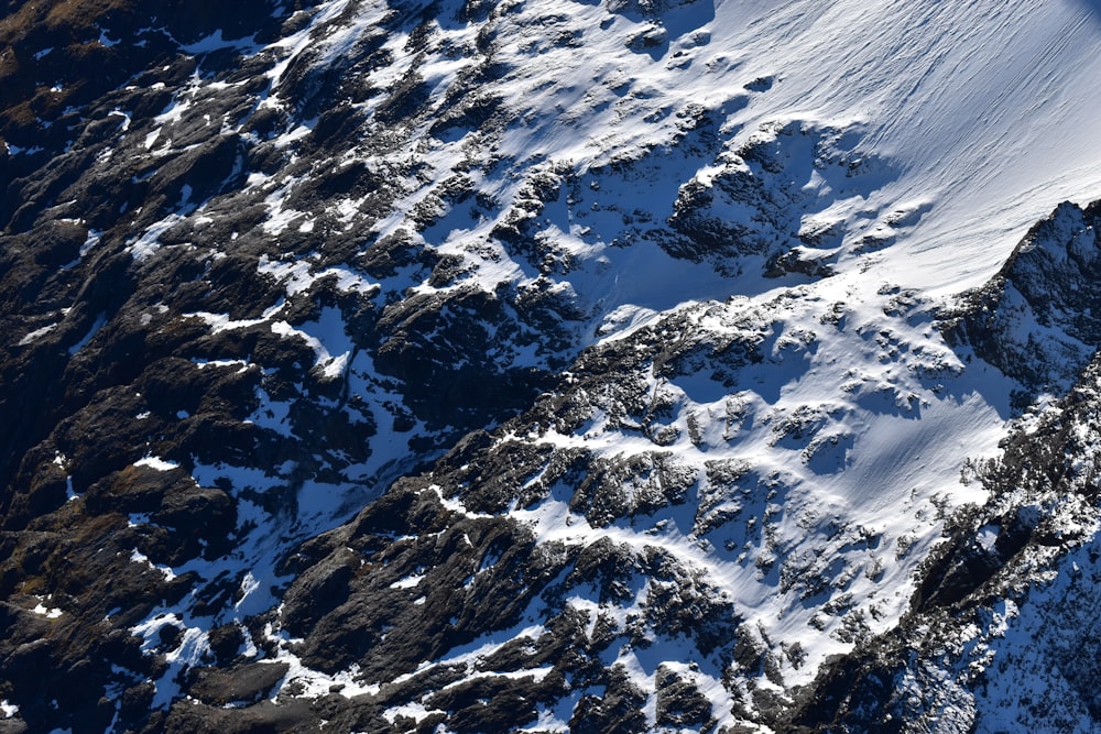 snow covered mountain during daytime