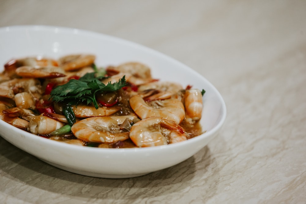 cooked food on white ceramic bowl