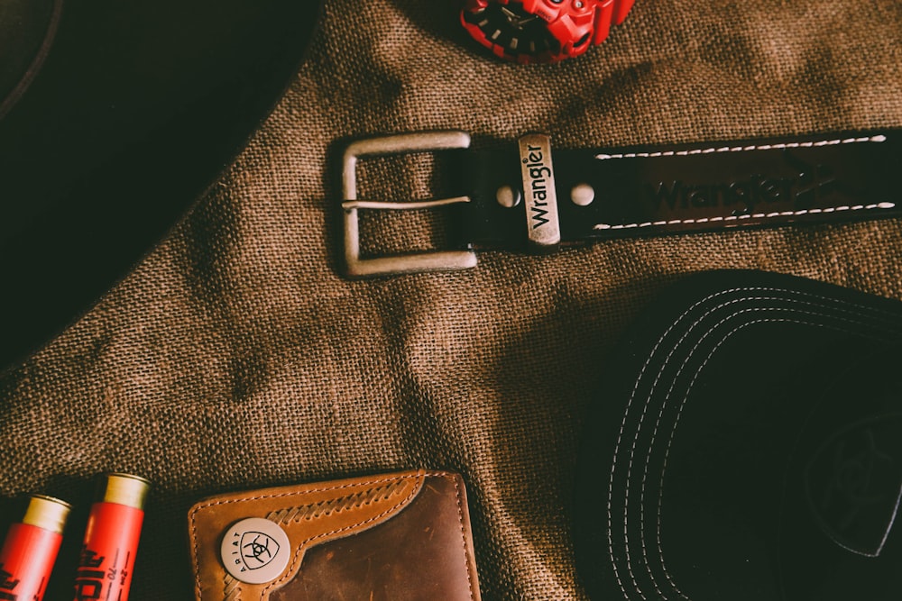 black and brown leather belt