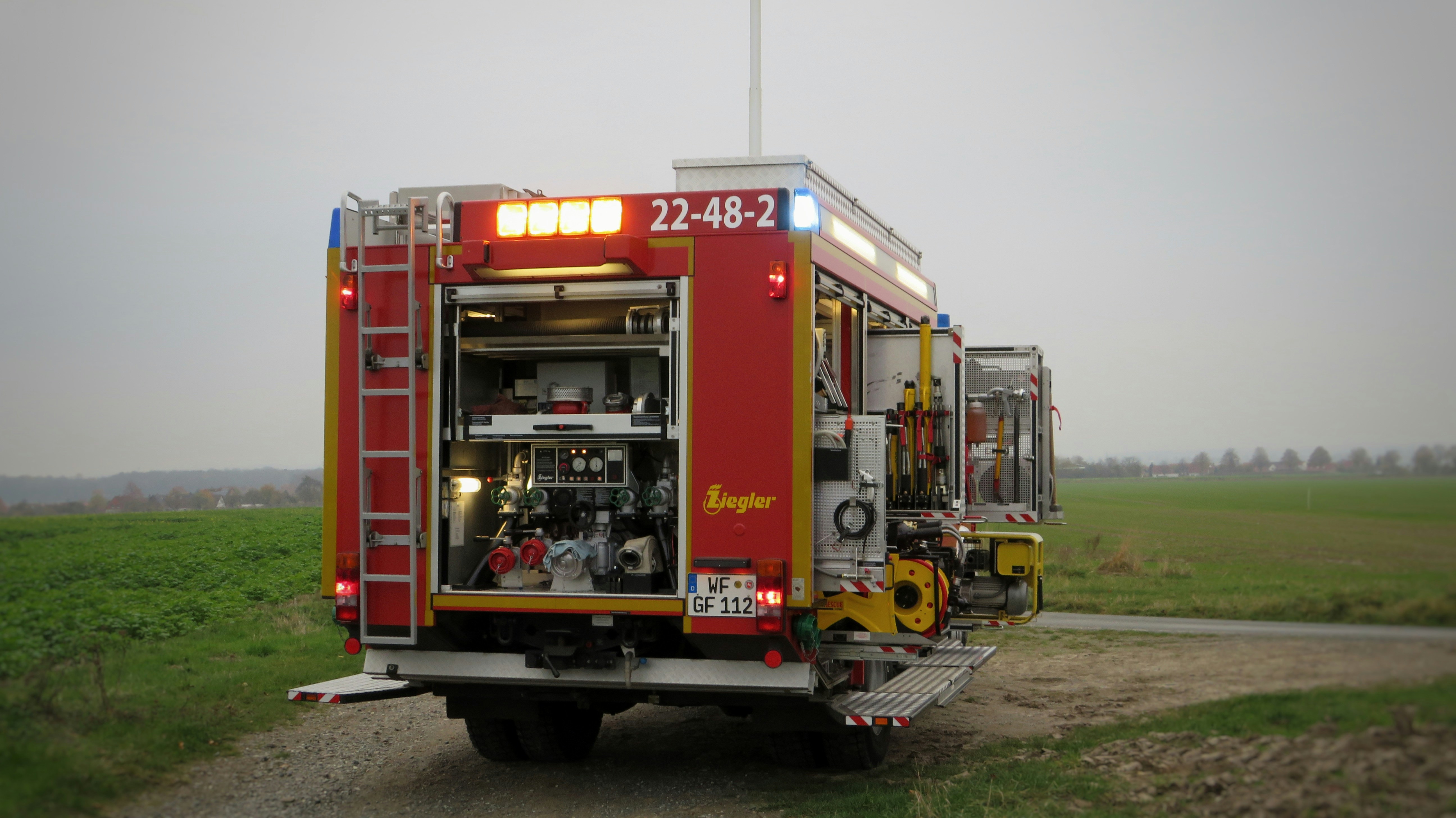 red and yellow train during daytime
