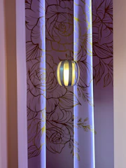 Decorative wall art and subtle lighting creating a warm atmosphere.