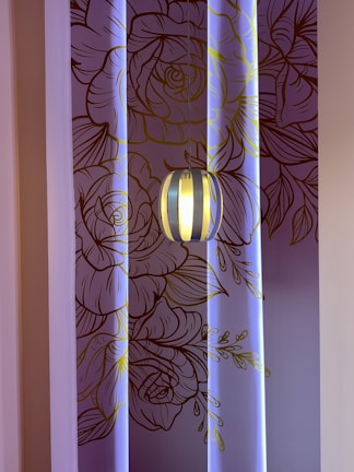 A vibrant wall art piece featuring intricate patterns in warm tones, displayed in a cozy living room.