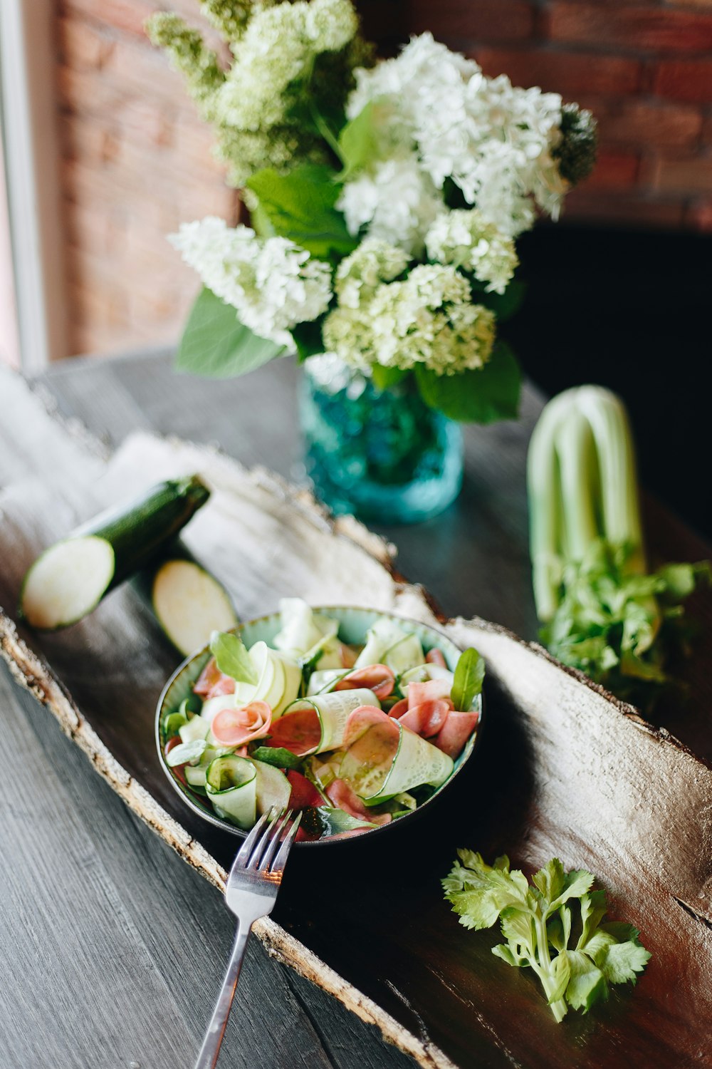 vegetable salad on black ceramic bowl