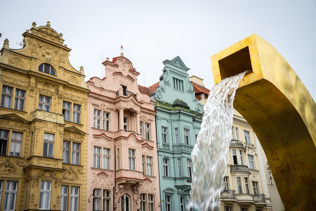 water fountain in front of brown concrete building