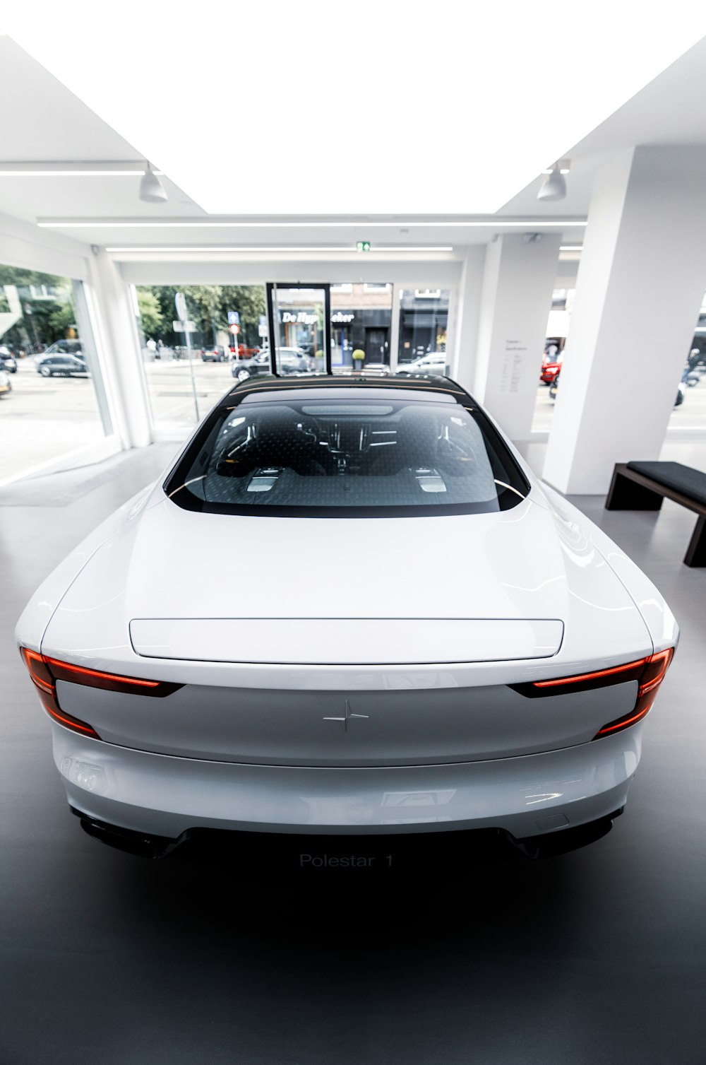 white porsche 911 parked in garage