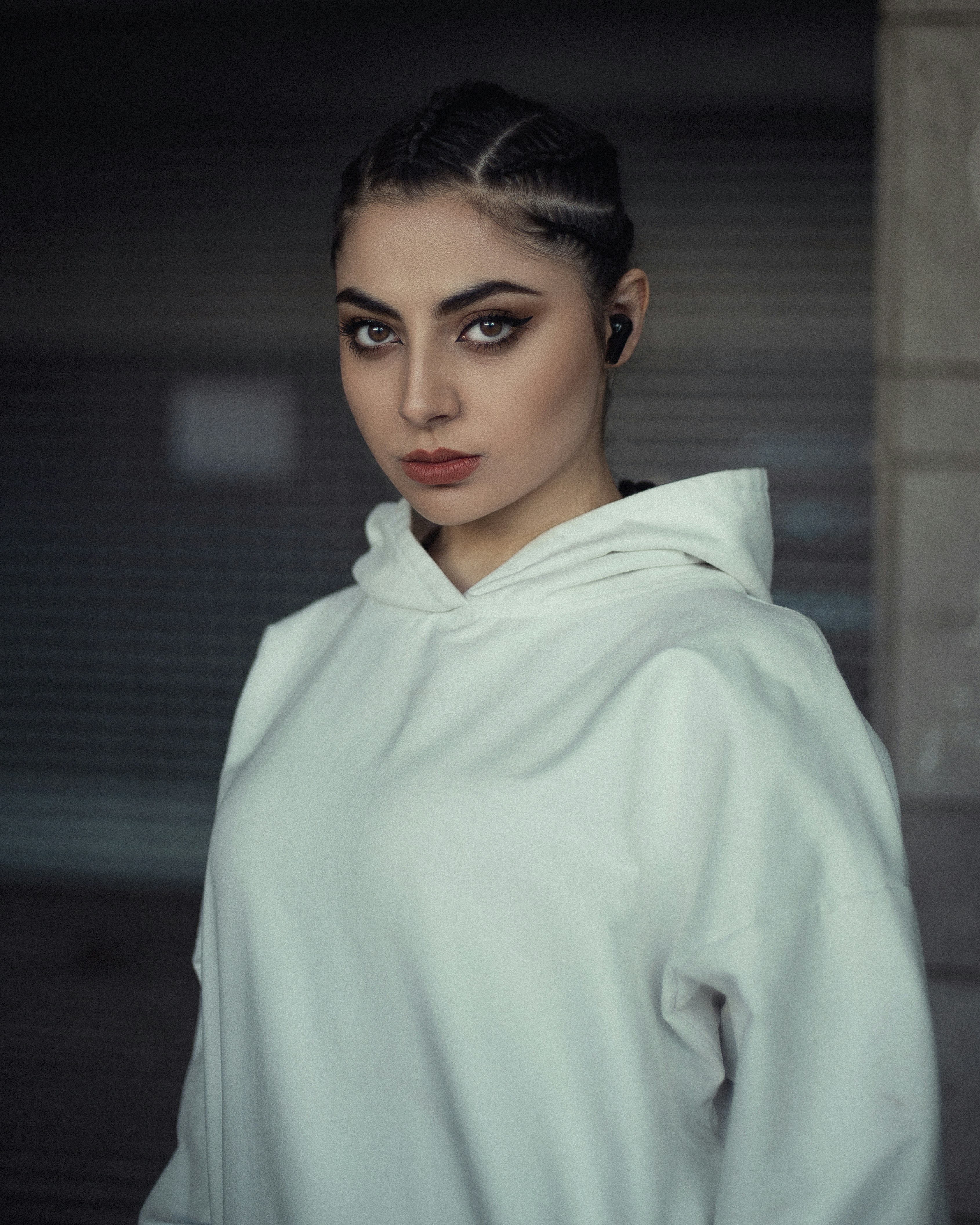 woman in white turtle neck long sleeve shirt