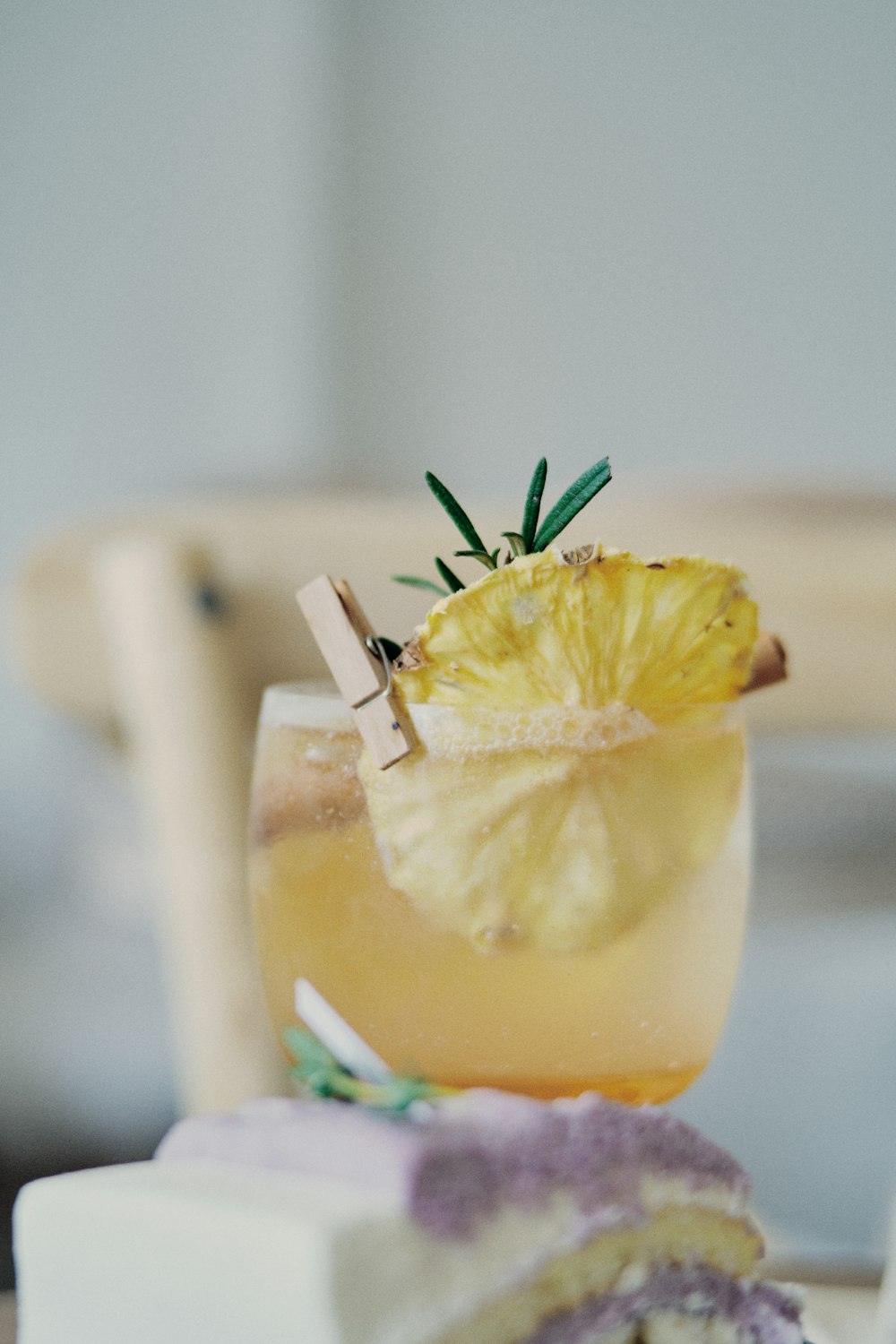 yellow fruit juice in clear drinking glass