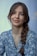 woman in blue and white floral button up shirt