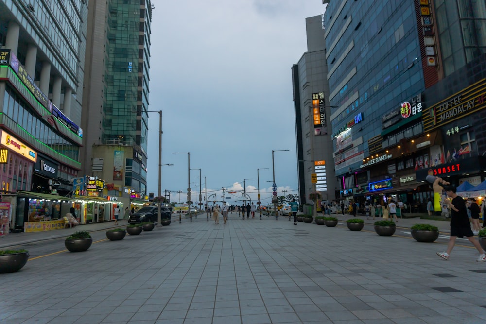 cars on road near buildings during daytime