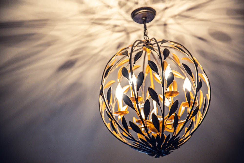 white and gold floral pendant lamp
