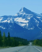 white and black mountain under blue sky during daytime