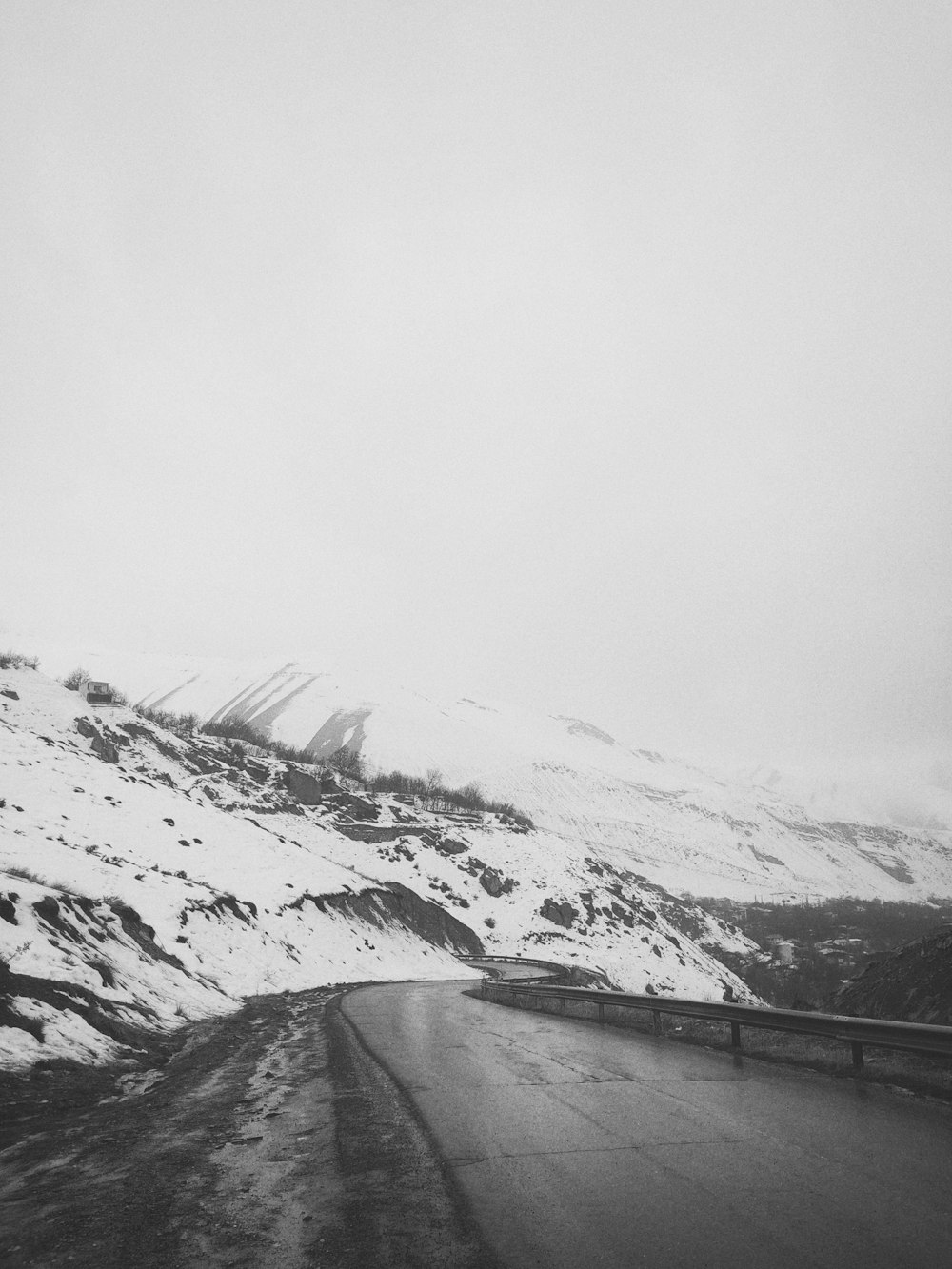 snow covered mountain during daytime