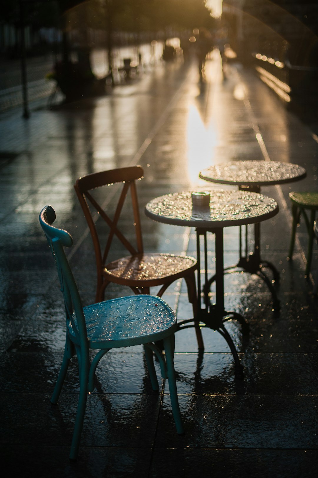 black metal round table with chairs