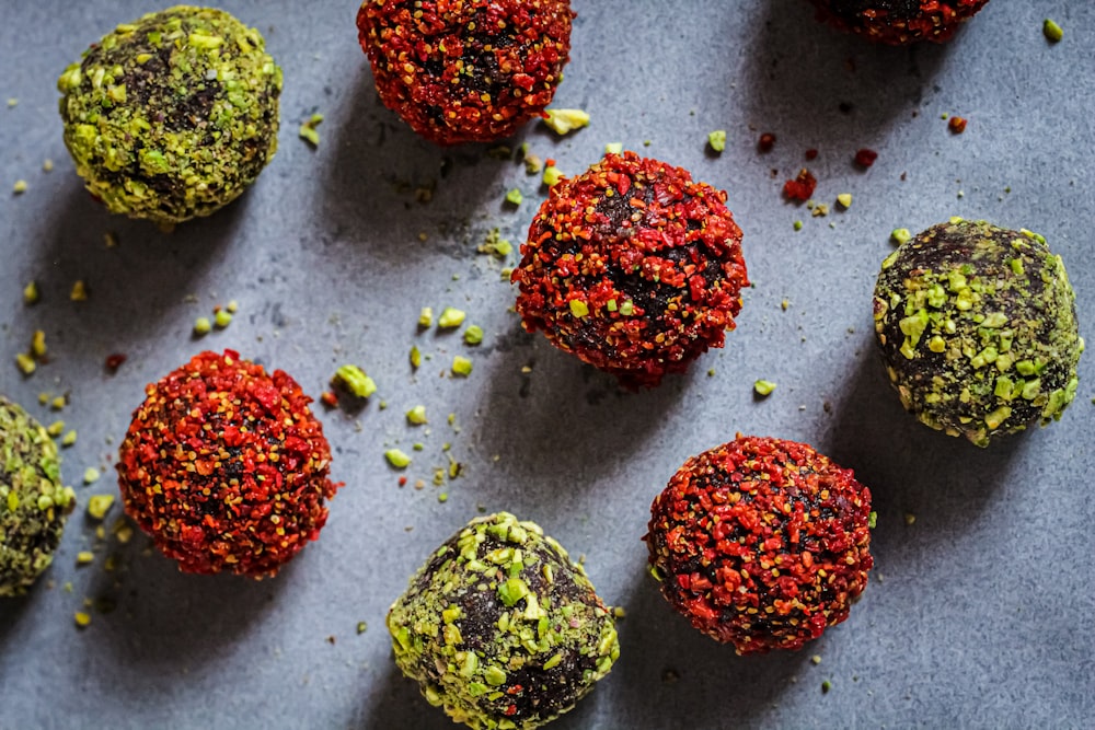 red green and yellow round fruits