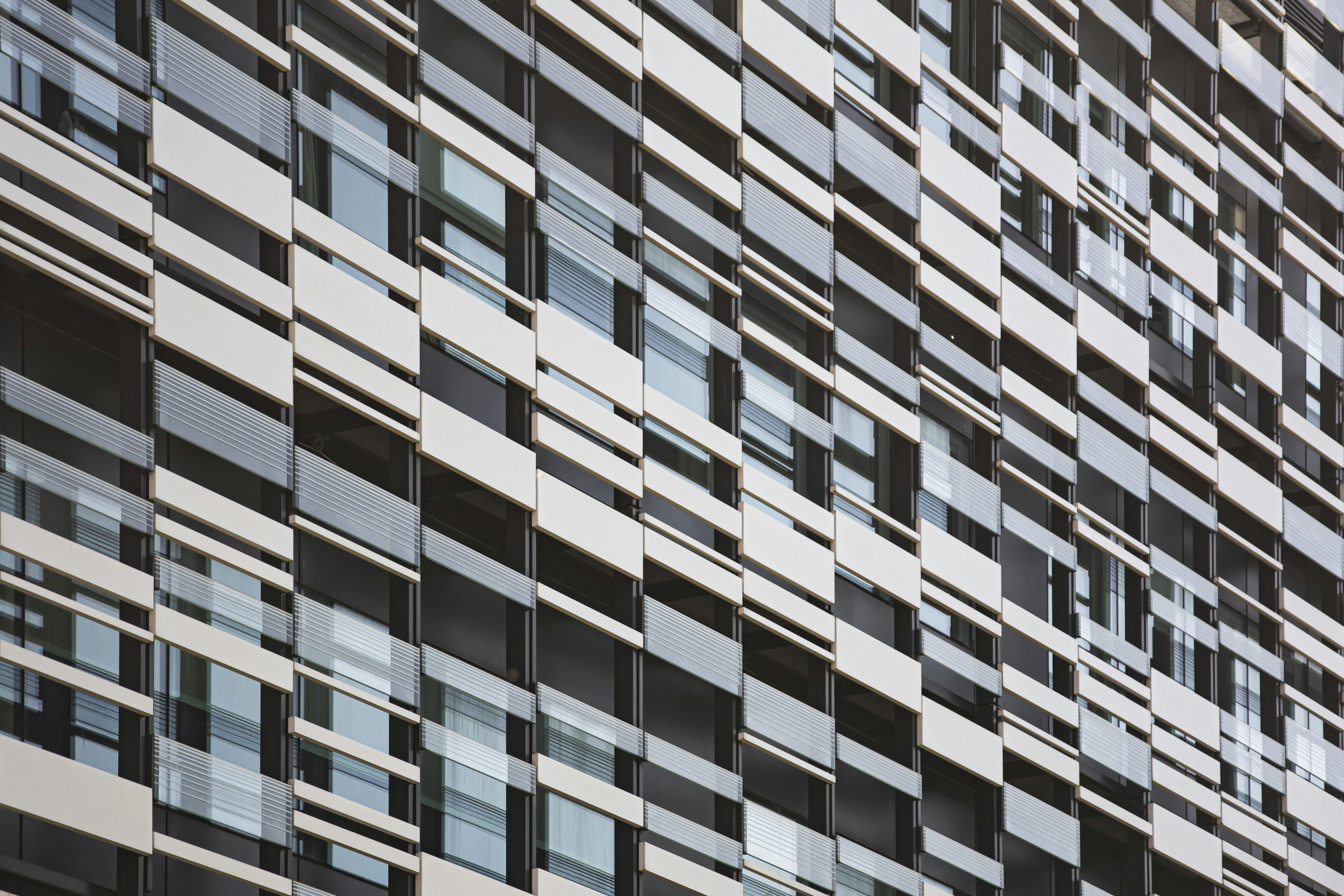 Brown and white concrete building pattern