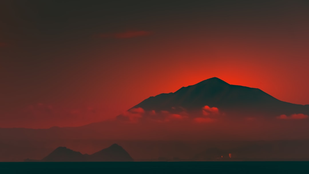 silhouette of mountain during sunset