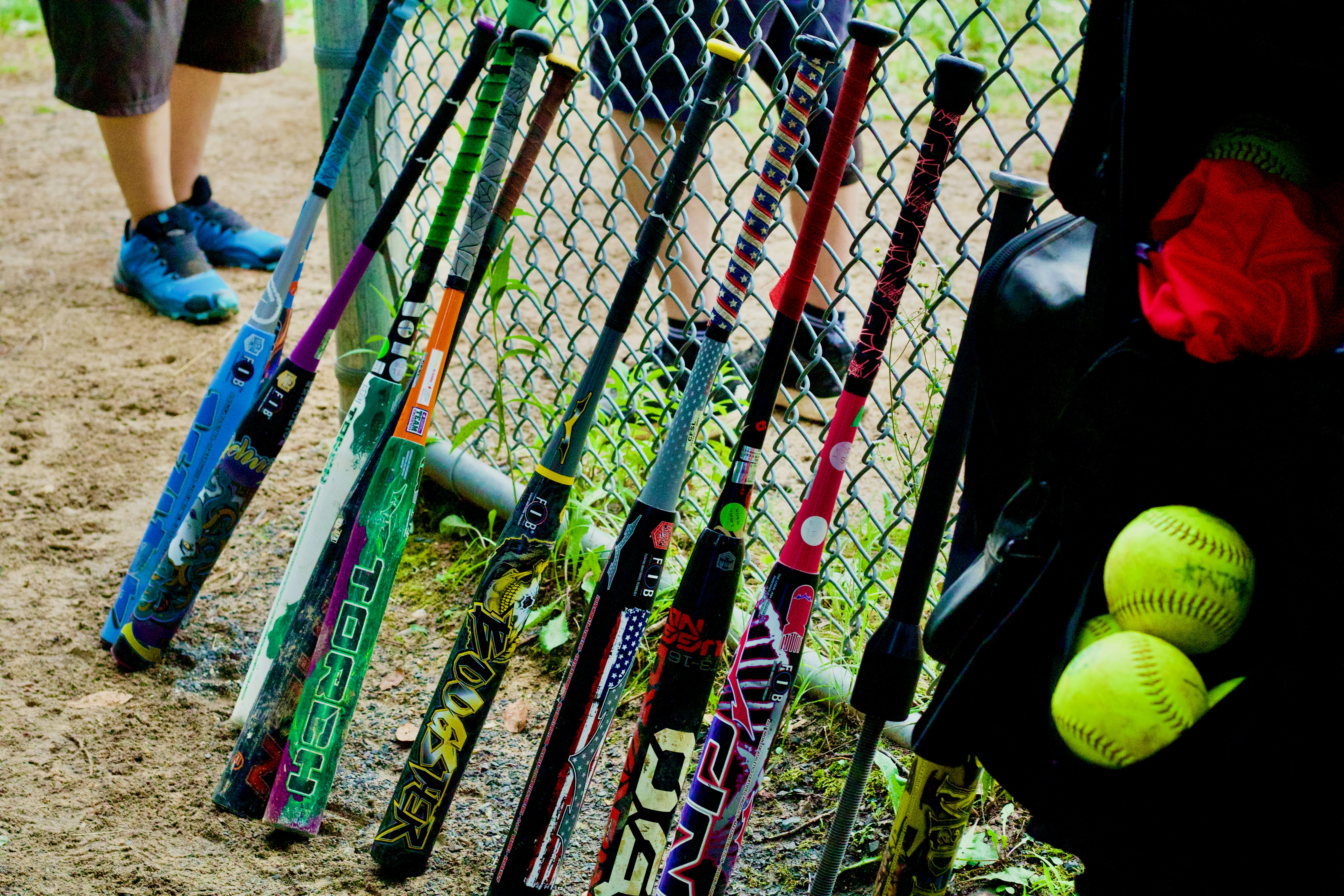 red and white ice hockey stick