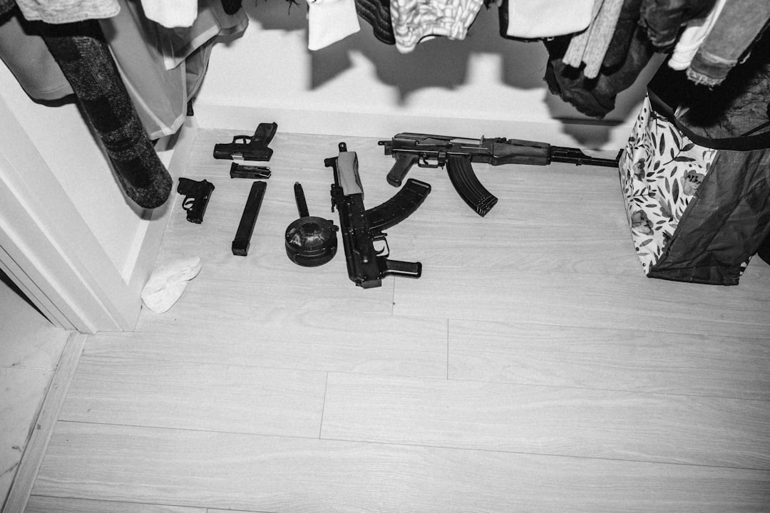 black assault rifle on floor