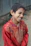 A happy young boy wearing colorful casual clothes from Nabd Al Shabab, smiling outdoors.