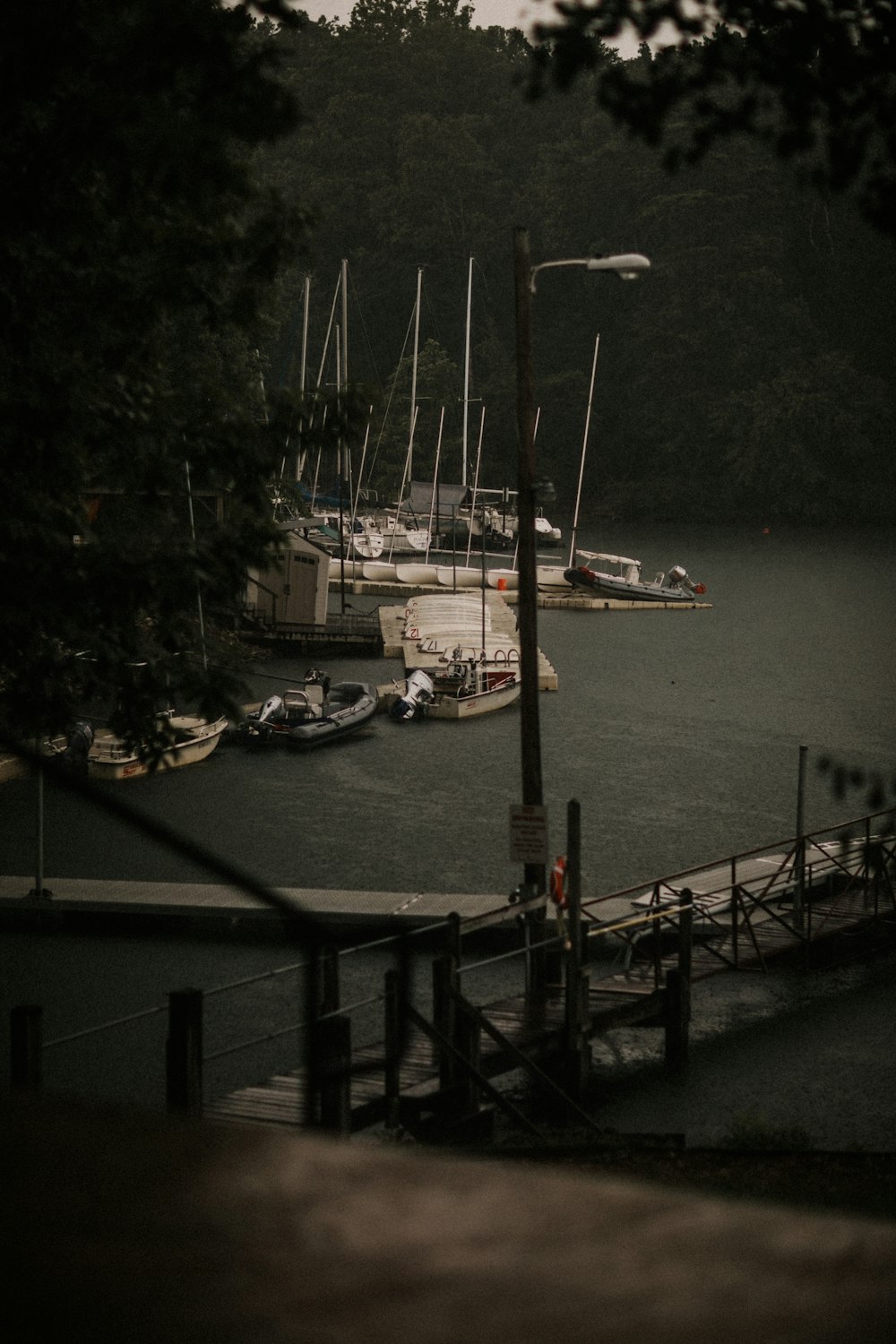 white and brown boat on body of water during daytime