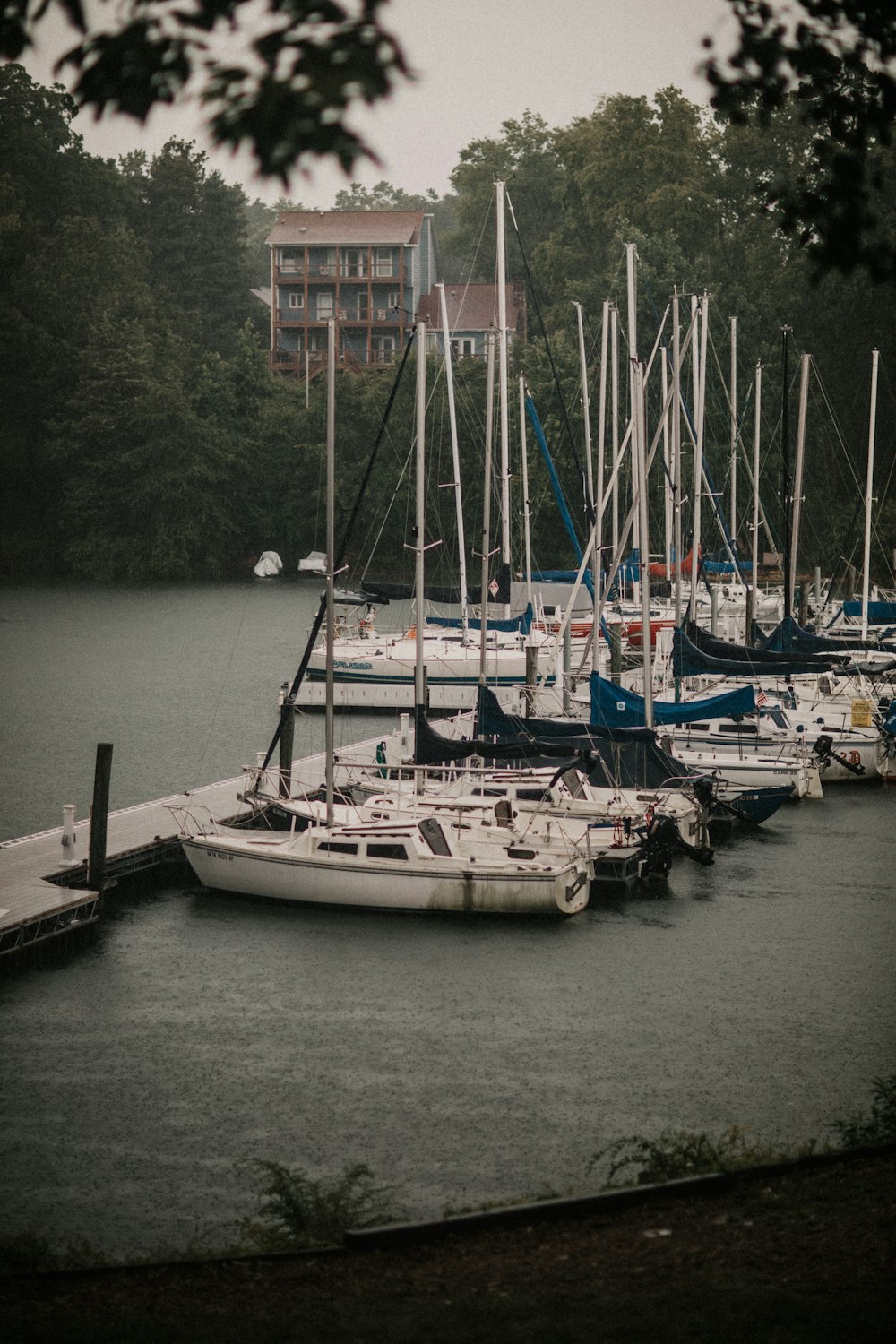 white boats on body of water during daytime