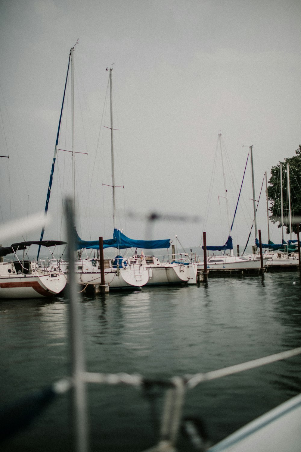 white and blue boat on water during daytime